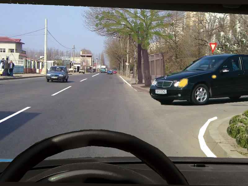 Trebuie să acordați prioritate autoturismului negru dacă acesta virează la stânga?